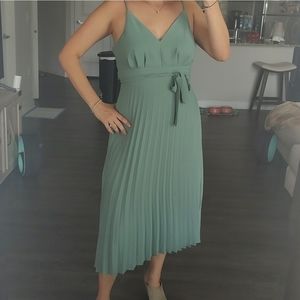 Pleated green dress